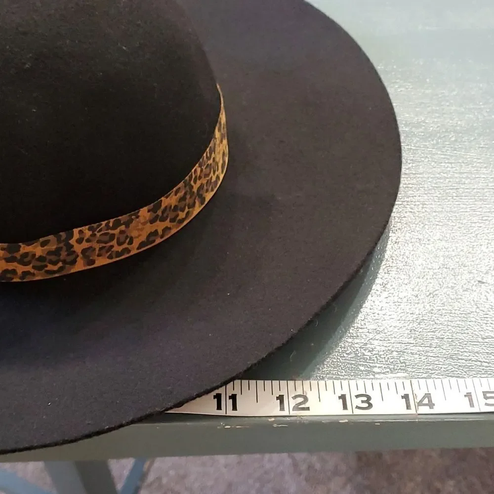 100% wool black hat with animal‎ print ribbon. 7